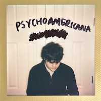 a photo of a man with the words psychoamericana on it
